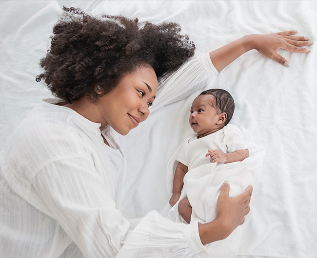 mommy and baby looking at each other